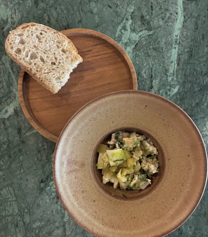 Pig's ear and lacto-fermented tomato, with bread